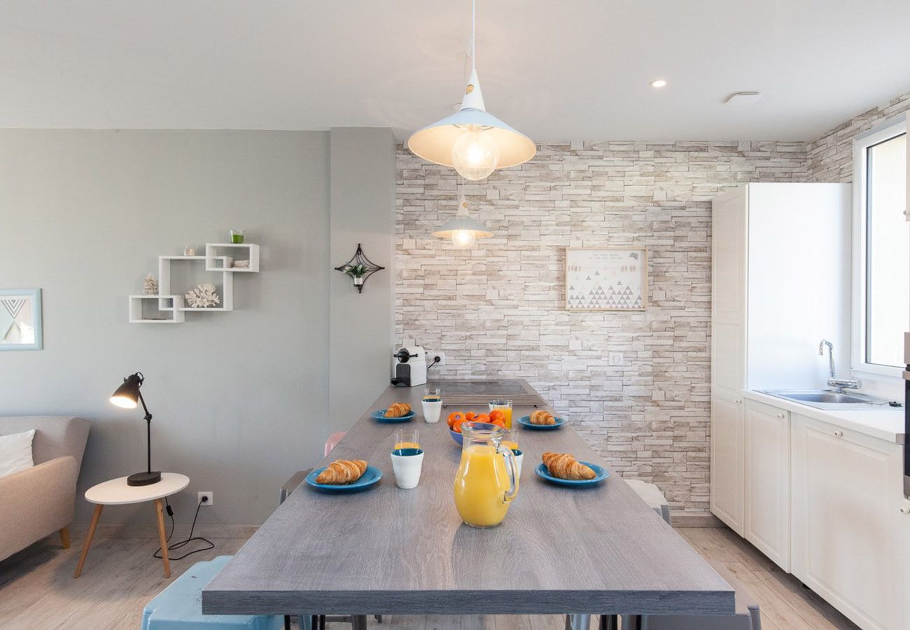 bright living room with modern open-plan kitchen