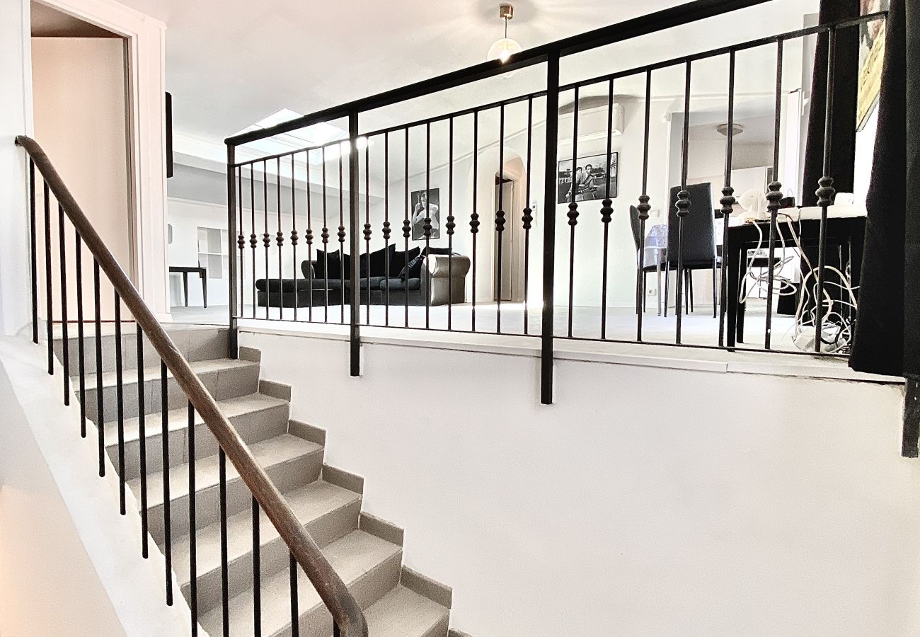 bright staircase with design railing