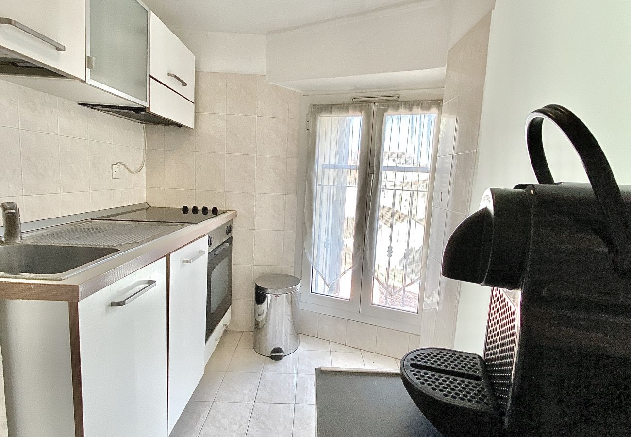 separate kitchen with optimised storage space