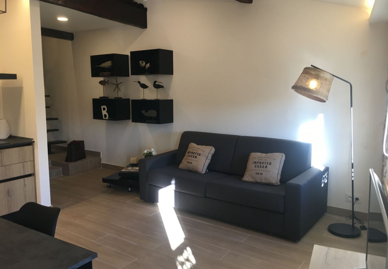 bright living room with comfortable sofa bed