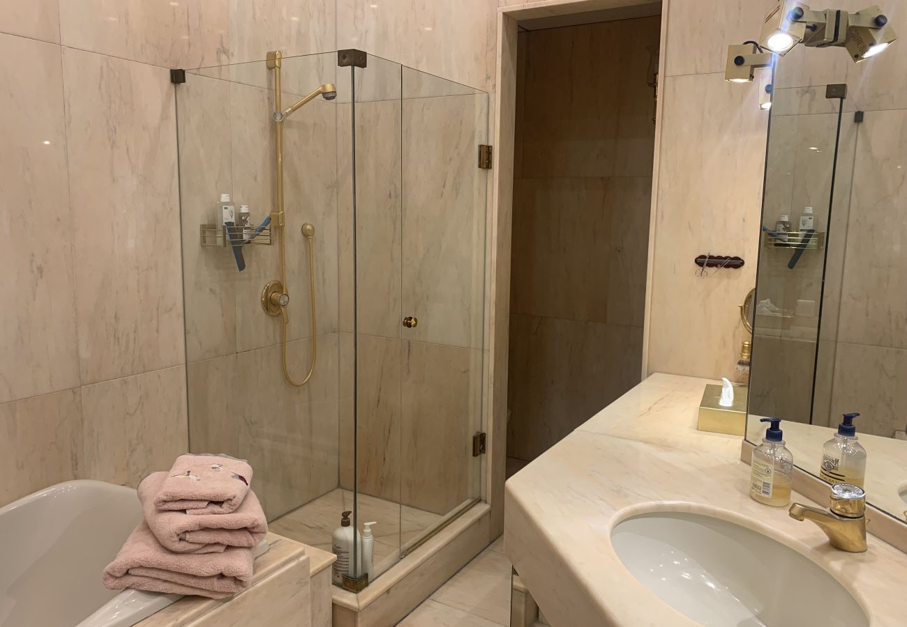 bathrooms with shower and bathtub