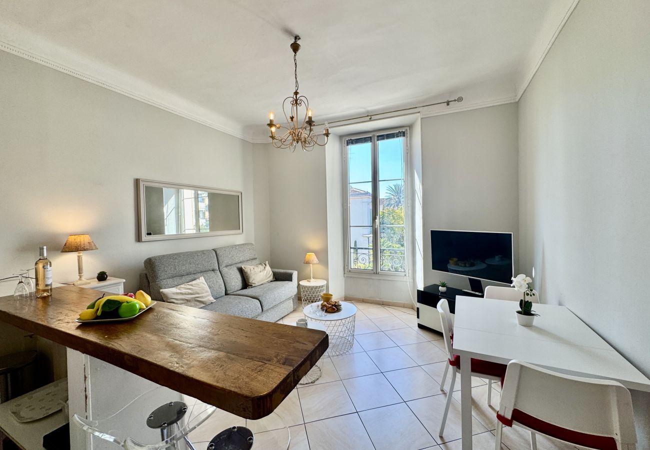 Bright living room with dining area at the back